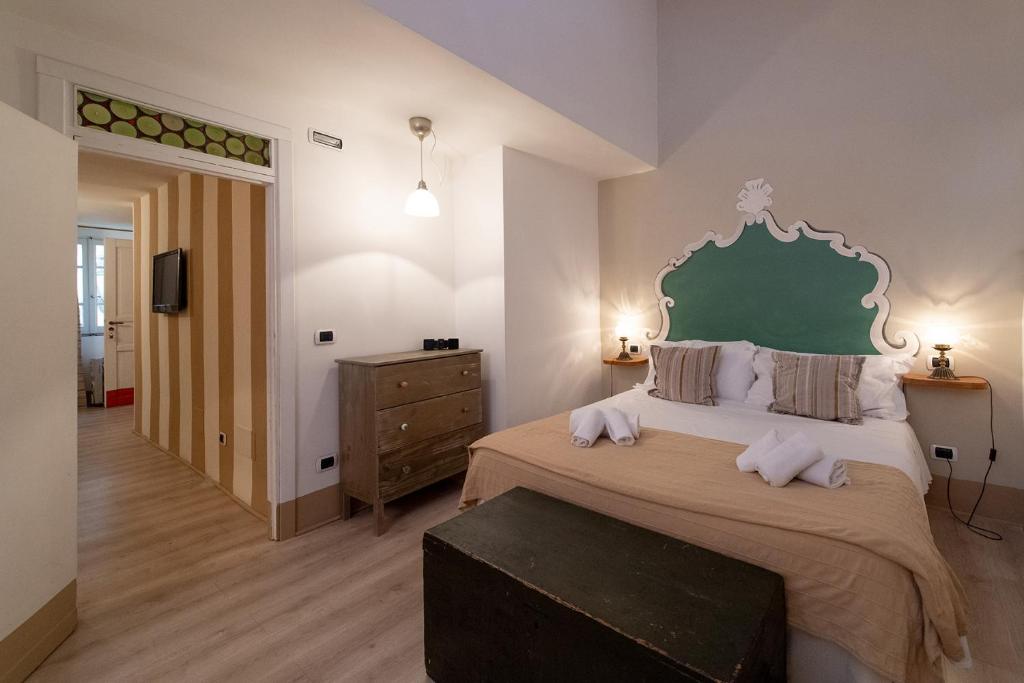 Postel nebo postele na pokoji v ubytování Hotel Borgo Vistalago