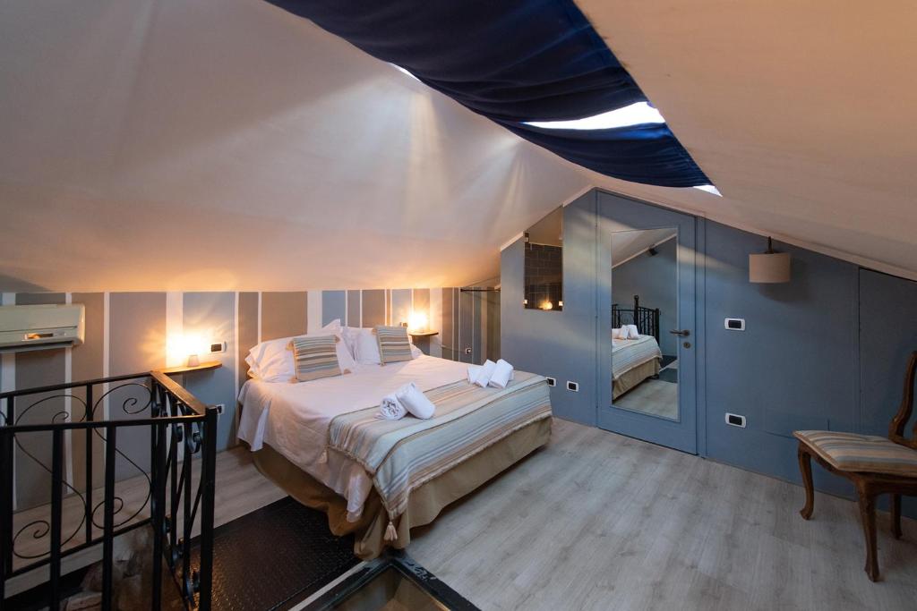 Postel nebo postele na pokoji v ubytování Hotel Borgo Vistalago
