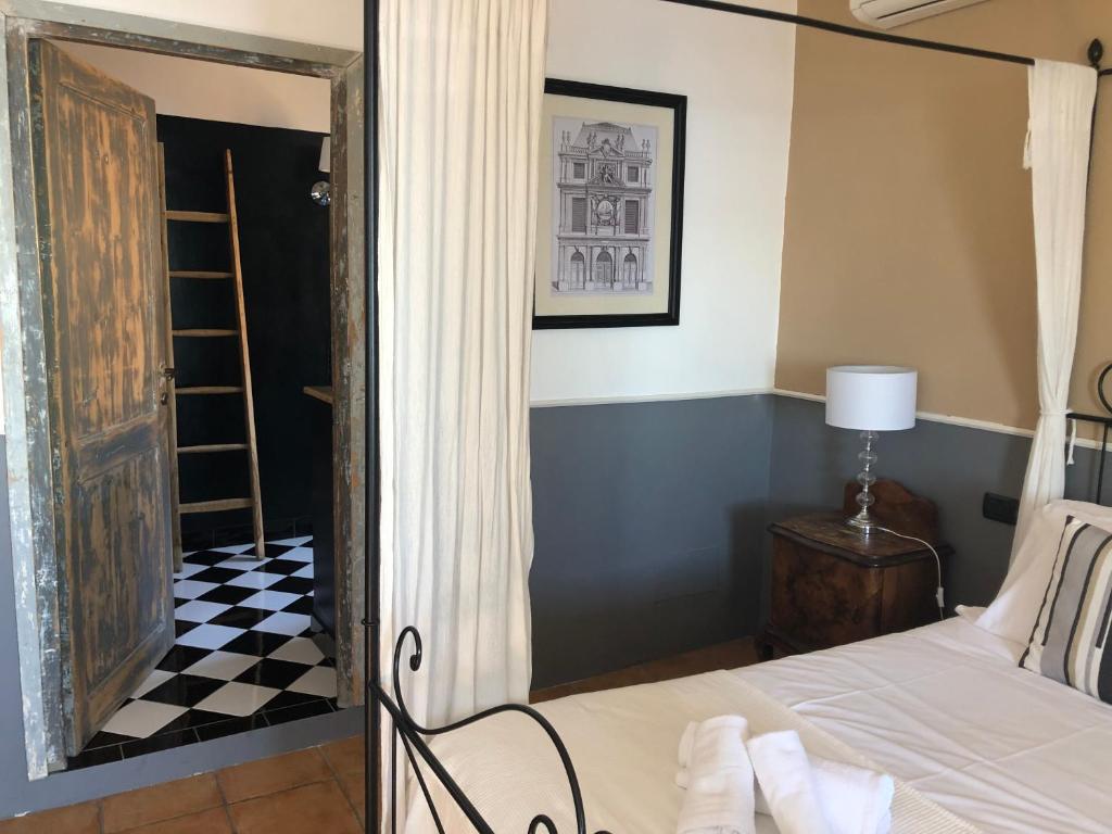 Postel nebo postele na pokoji v ubytování Hotel Borgo Vistalago