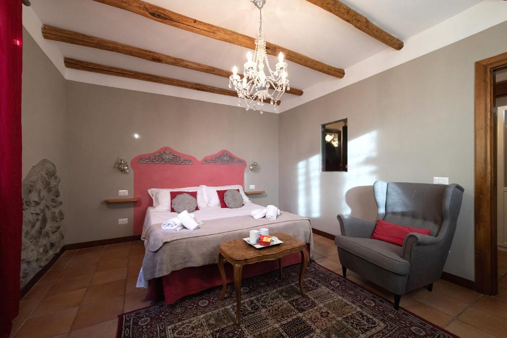 Postel nebo postele na pokoji v ubytování Hotel Borgo Vistalago