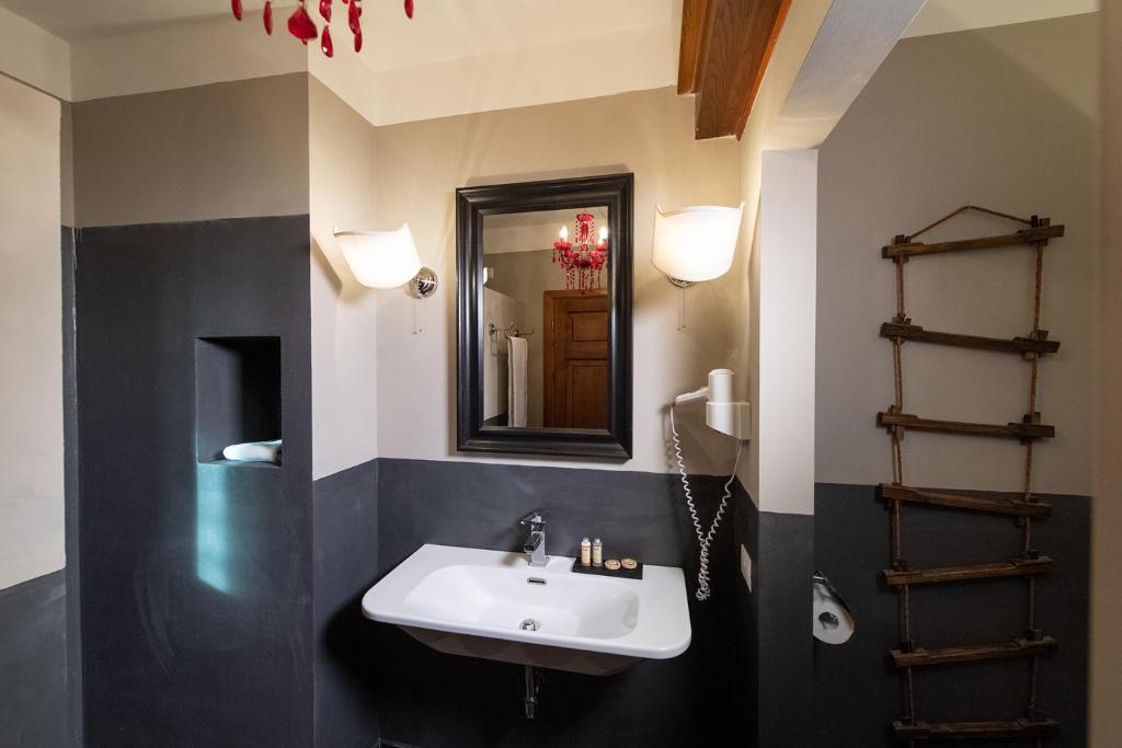 Koupelna v ubytování Hotel Borgo Vistalago