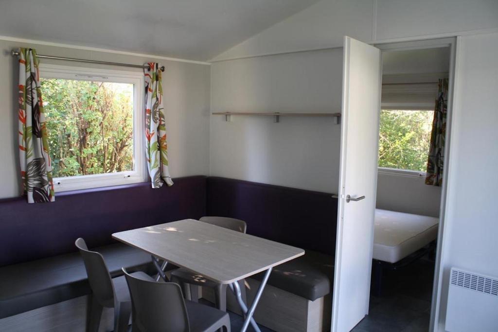 Postel nebo postele na pokoji v ubytování Bungalow Vacances