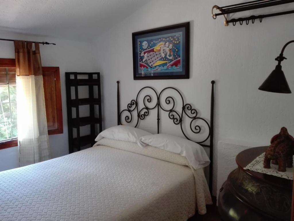 Posteľ alebo postele v izbe v ubytovaní Casa María I
