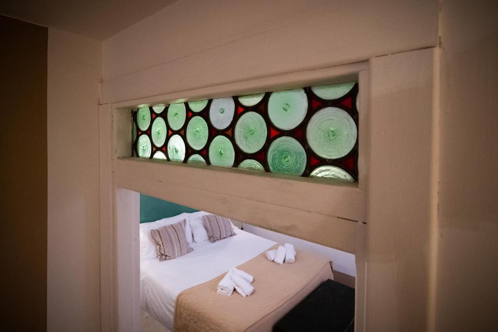 Postel nebo postele na pokoji v ubytování Hotel Borgo Vistalago