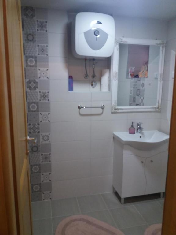 Koupelna v ubytování Apartments Vratnik