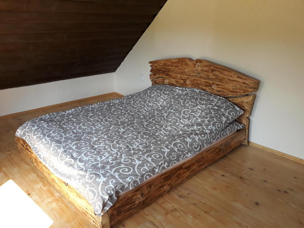 Postel nebo postele na pokoji v ubytování Eco Resort Nad Karpatamy