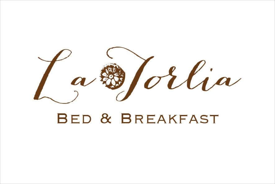 un jolita bed and breakfast logo di La Torlia - Bed & Breakfast a Mottola