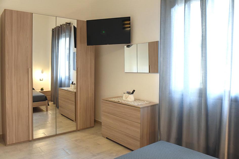 Łóżko lub łóżka w pokoju w obiekcie Kero House