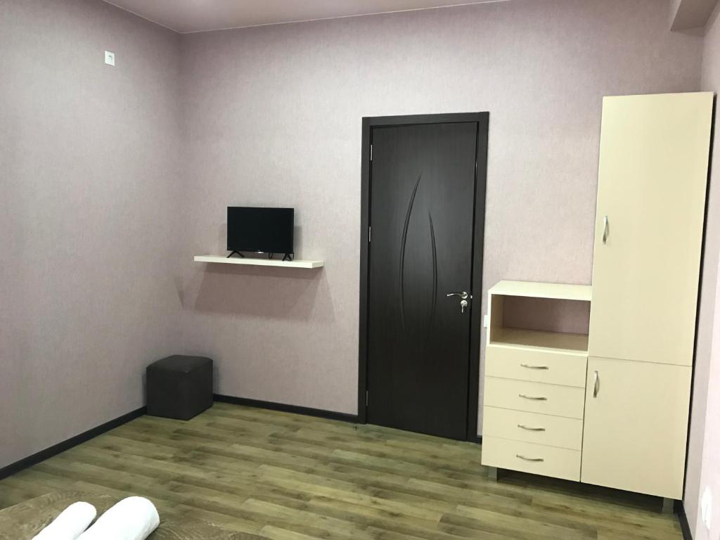 TV a/nebo společenská místnost v ubytování Gamarjoba Hotel