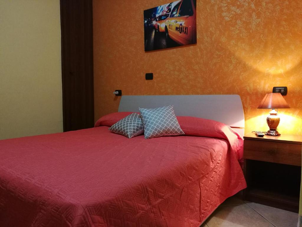 Postel nebo postele na pokoji v ubytování Garden Inn