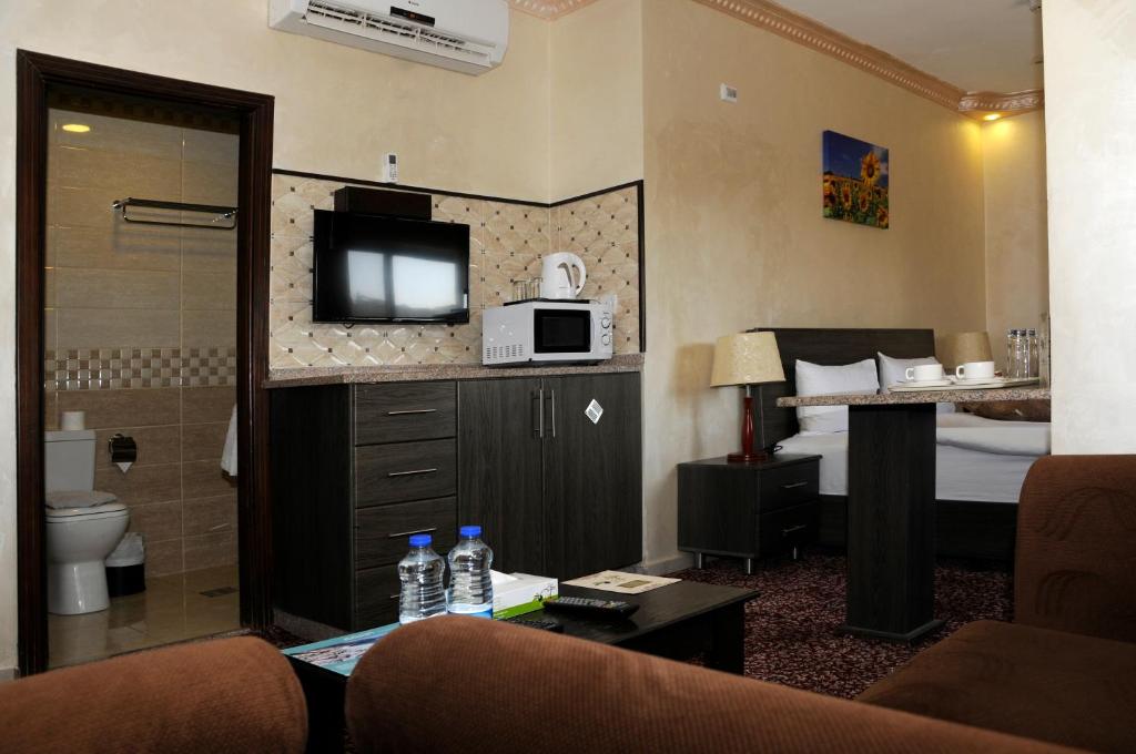 Kuhinja ili čajna kuhinja u objektu Olive Hotel Amman