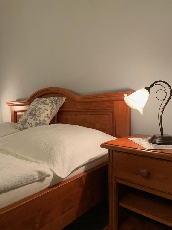 Postel nebo postele na pokoji v ubytování Pension Amadeus & Apartments