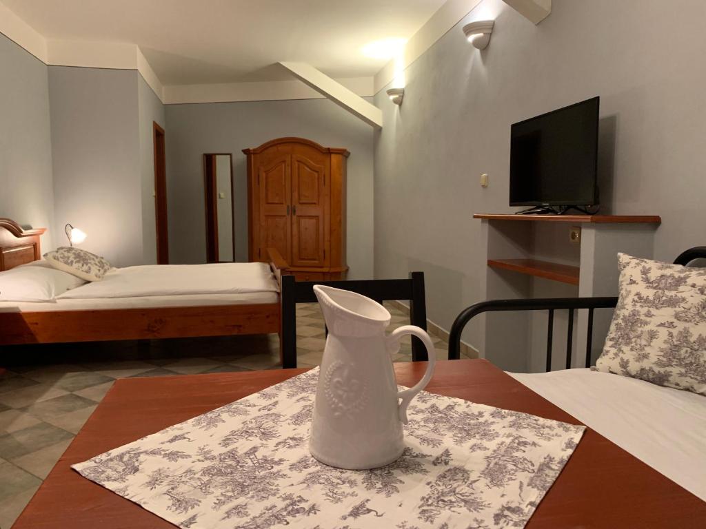 Postel nebo postele na pokoji v ubytování Pension Amadeus & Apartments