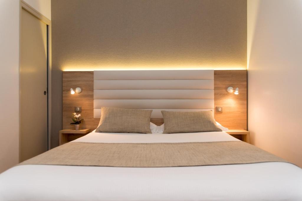 Cama o camas de una habitación en Hôtel Lutétia & Spa