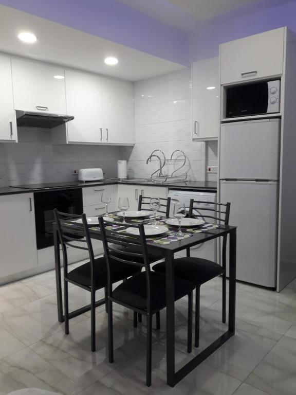 Kuchyň nebo kuchyňský kout v ubytování P L Sunorama Beach Garden 302