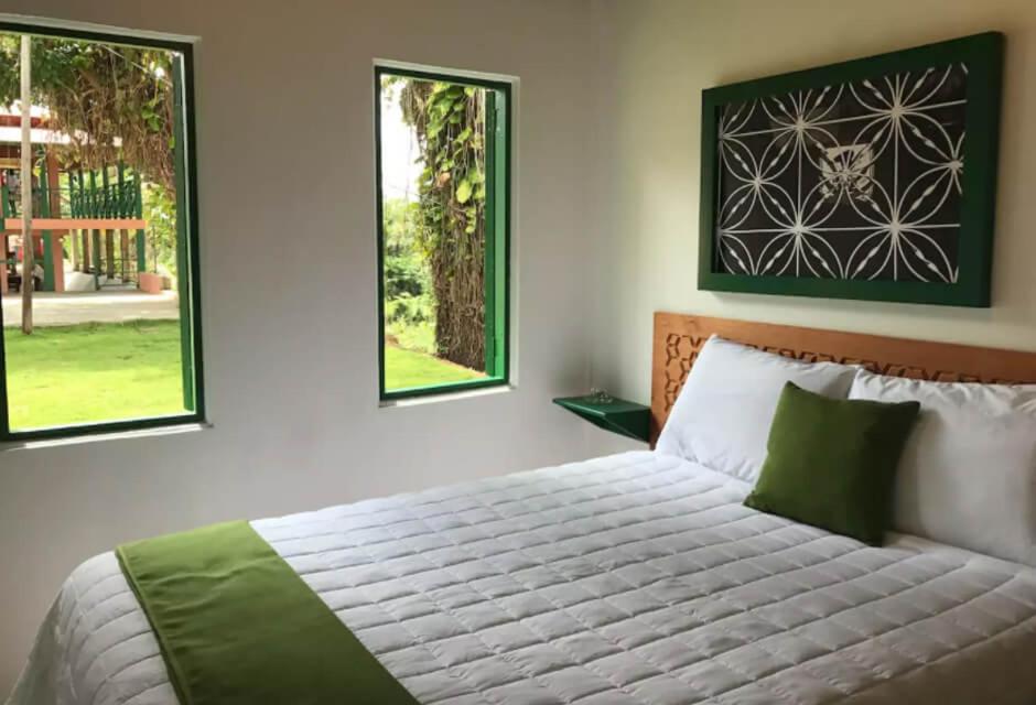 Postel nebo postele na pokoji v ubytování Hacienda Juanita