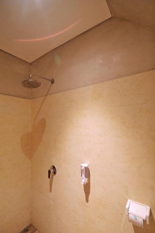 Koupelna v ubytování Meranggi Home Stay