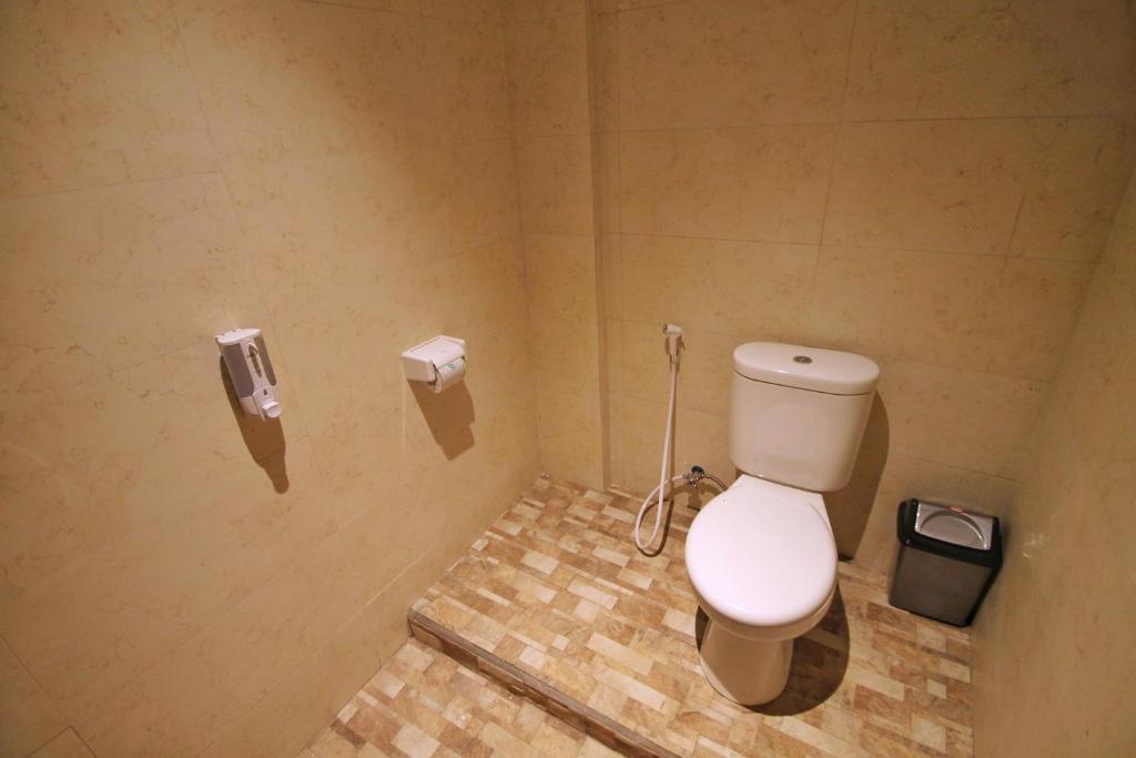 Koupelna v ubytování Meranggi Home Stay