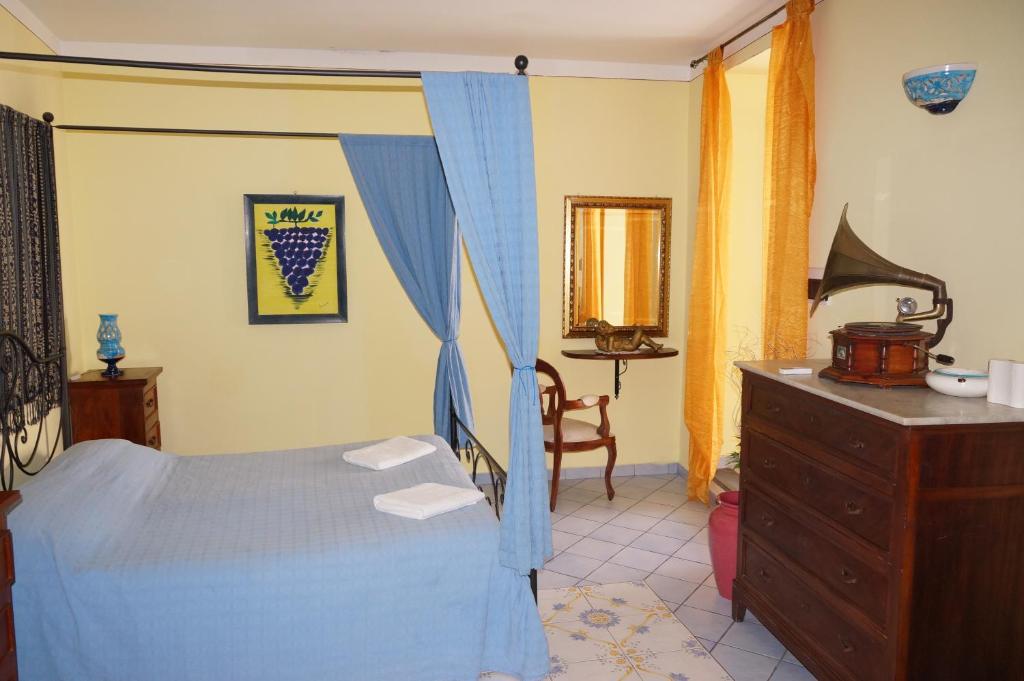 Postel nebo postele na pokoji v ubytování Casa Matarazzo