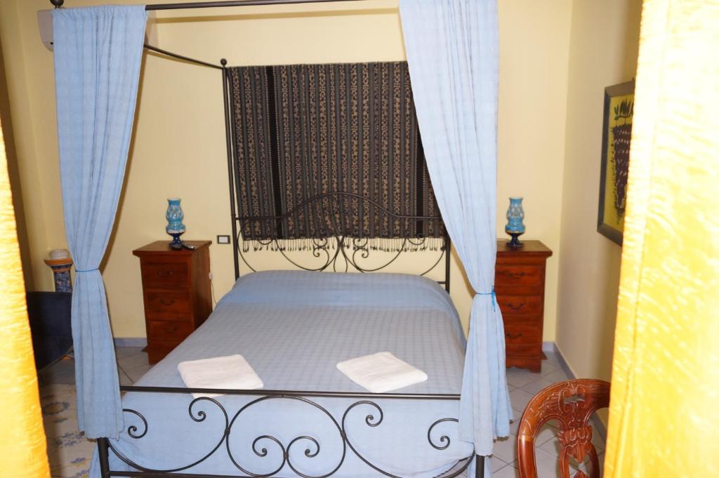 Postel nebo postele na pokoji v ubytování Casa Matarazzo