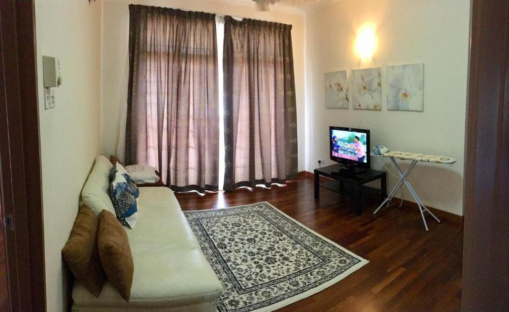 TV a/nebo společenská místnost v ubytování Putrajaya 1808 Homestay