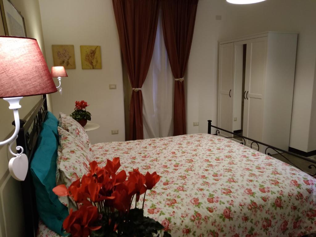 Łóżko lub łóżka w pokoju w obiekcie Una Scala Dal Centro