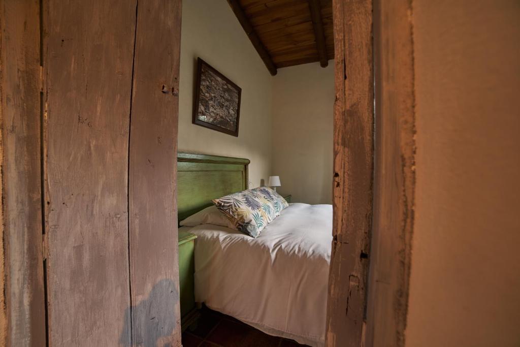 Postel nebo postele na pokoji v ubytování Valle Granado