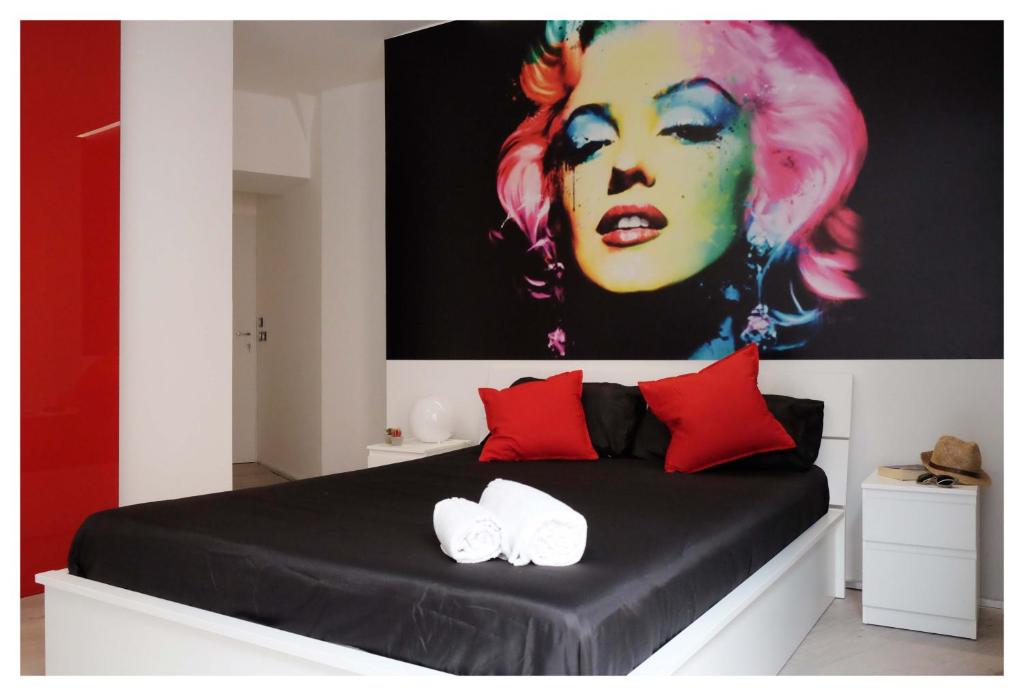 Uma cama ou camas num quarto em B&B Elmi