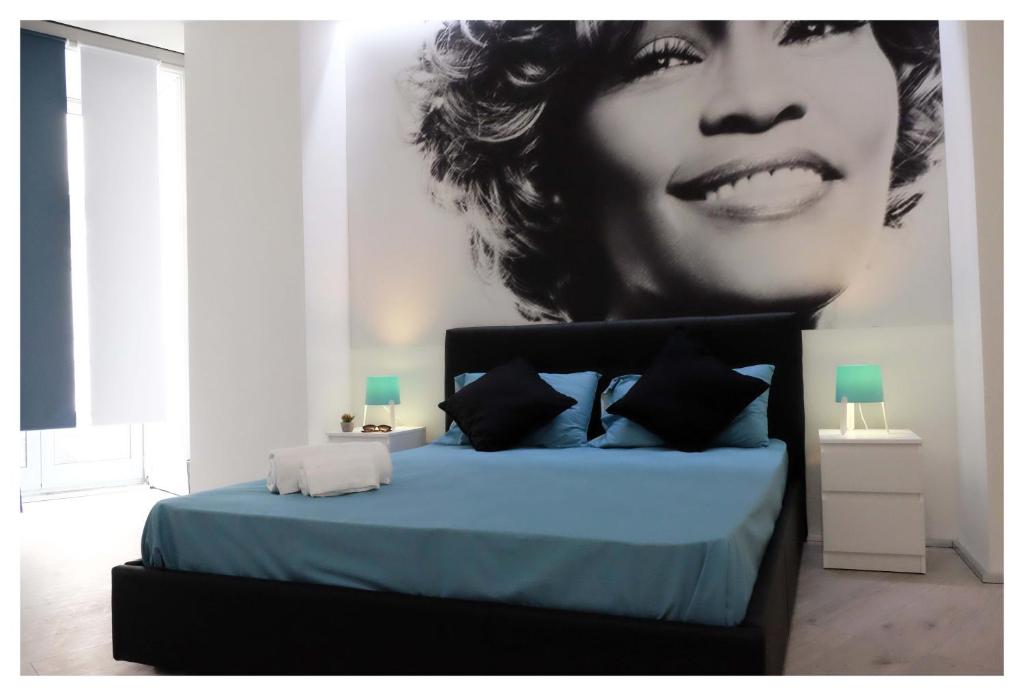 Uma cama ou camas num quarto em B&B Elmi