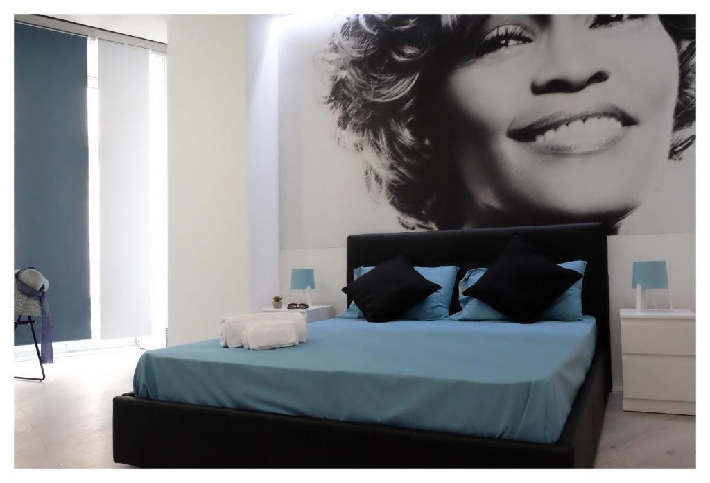 Uma cama ou camas num quarto em B&B Elmi
