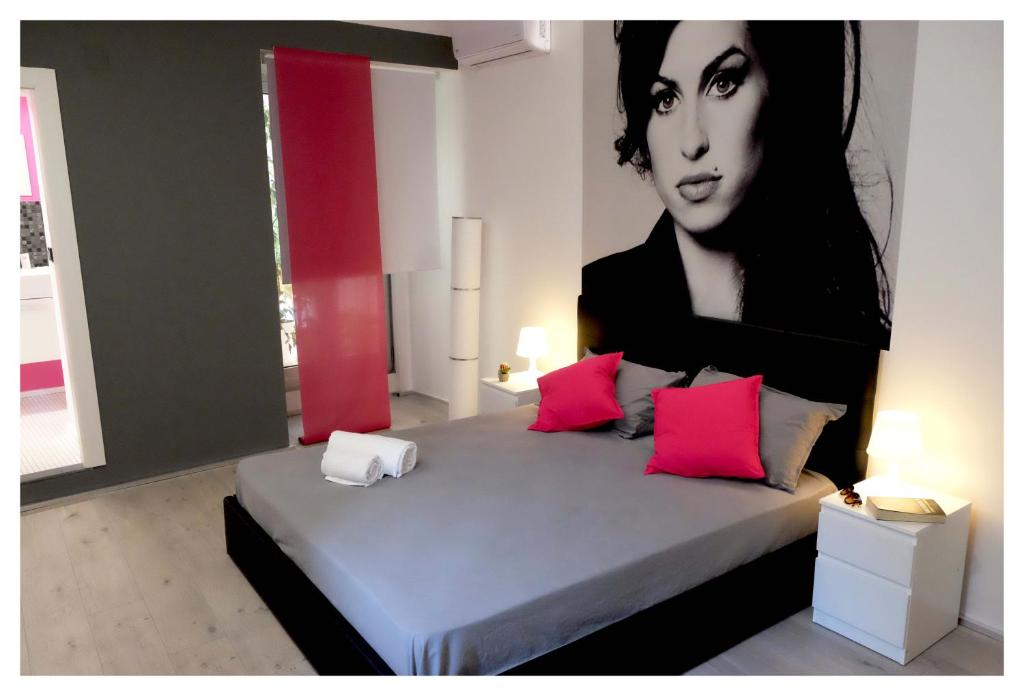 Uma cama ou camas num quarto em B&B Elmi