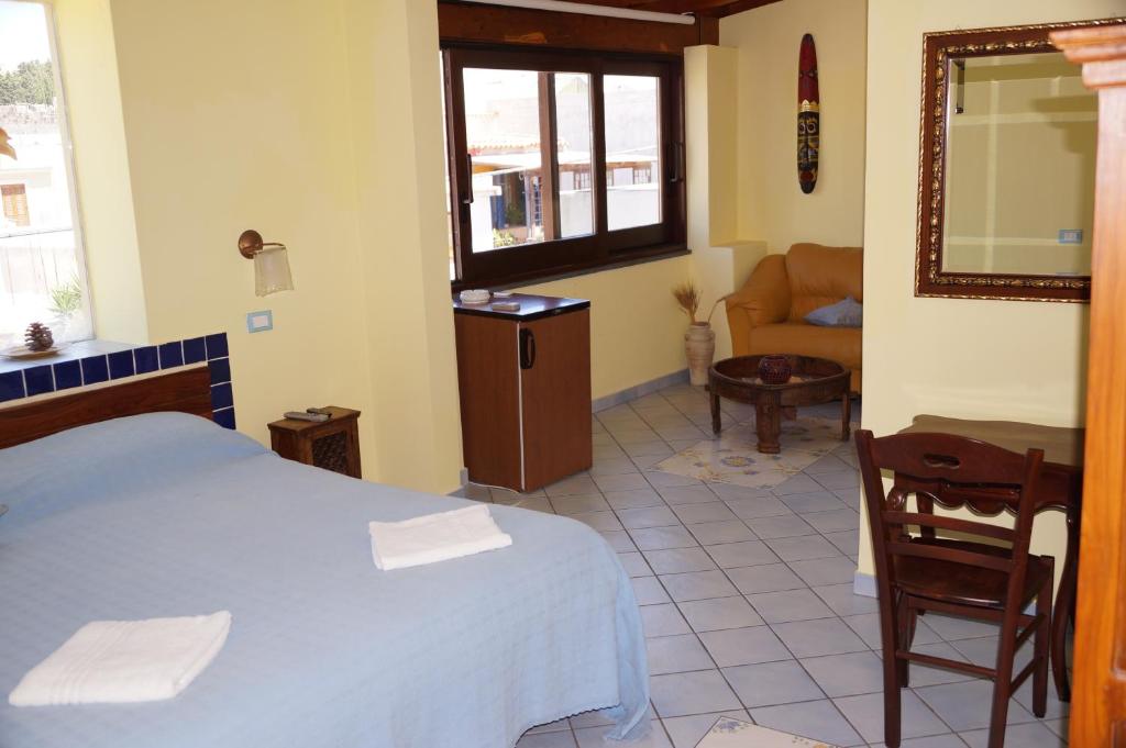 Postel nebo postele na pokoji v ubytování Casa Matarazzo