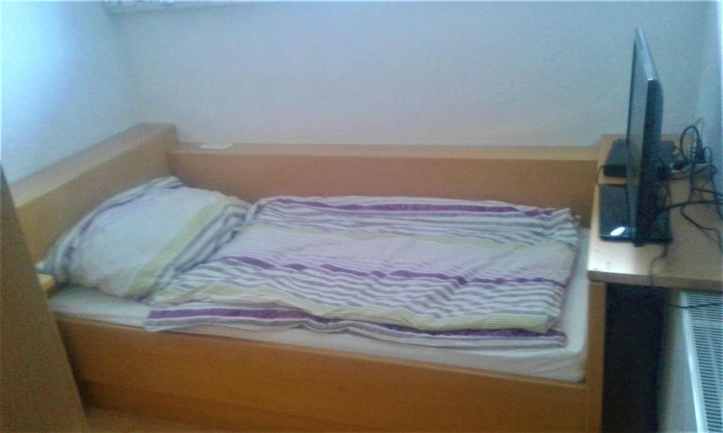 A bed or beds in a room at Apartment MASCH