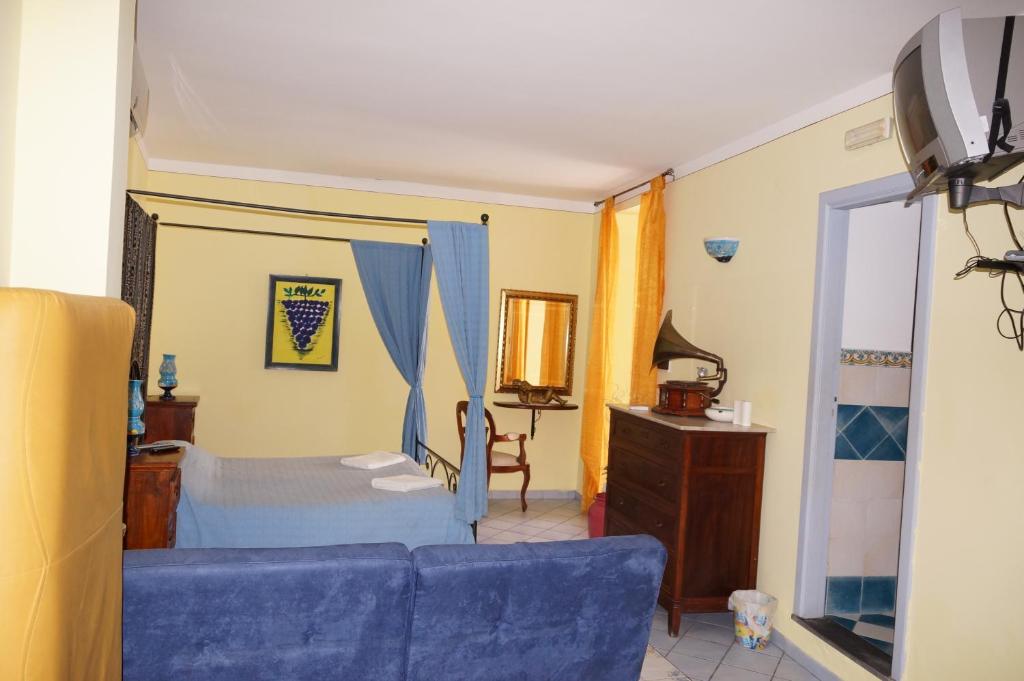 Postel nebo postele na pokoji v ubytování Casa Matarazzo