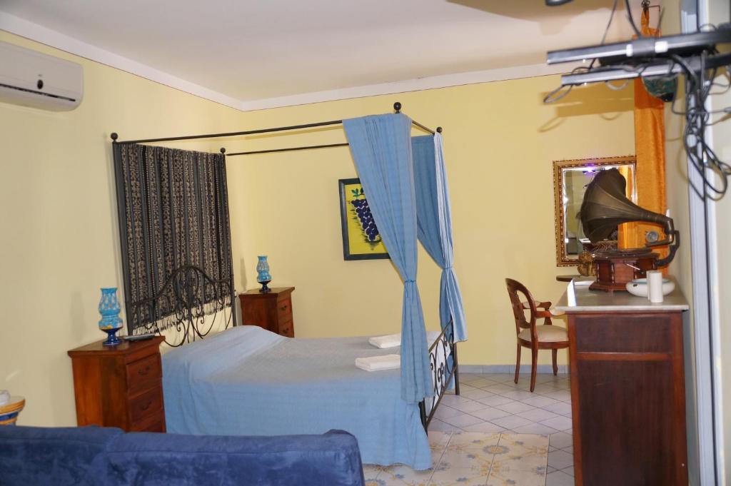 Postel nebo postele na pokoji v ubytování Casa Matarazzo