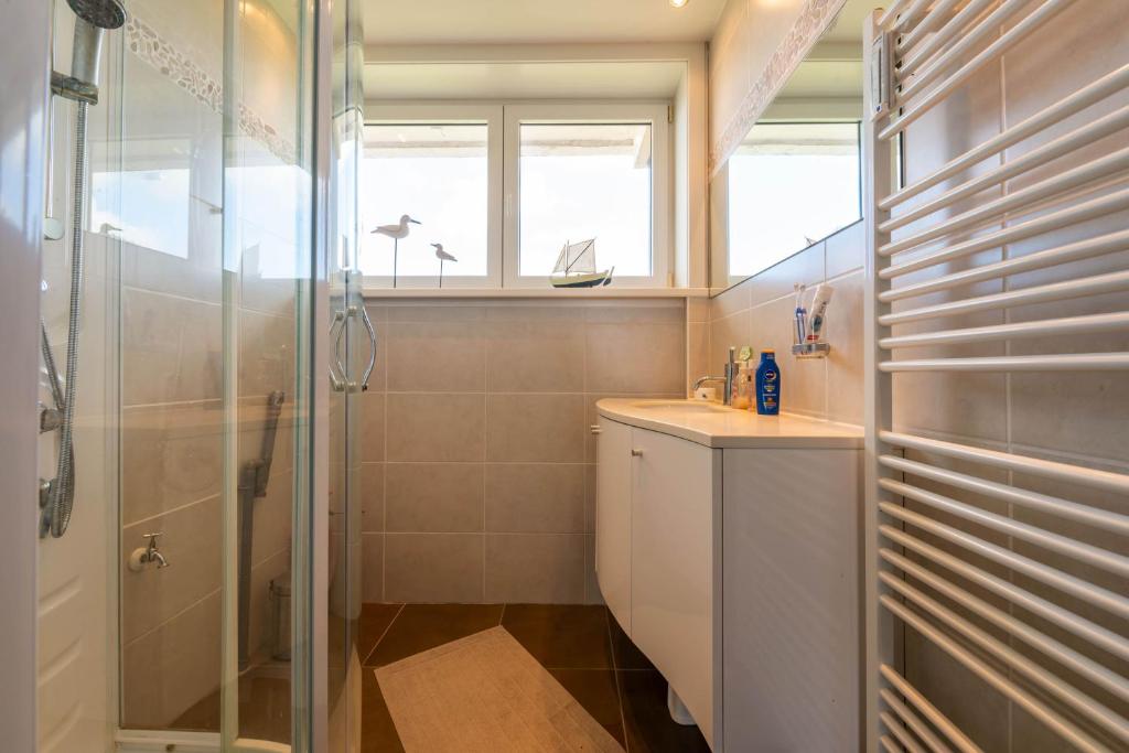 Koupelna v ubytování Panoramic & Modern apartment with sea view
