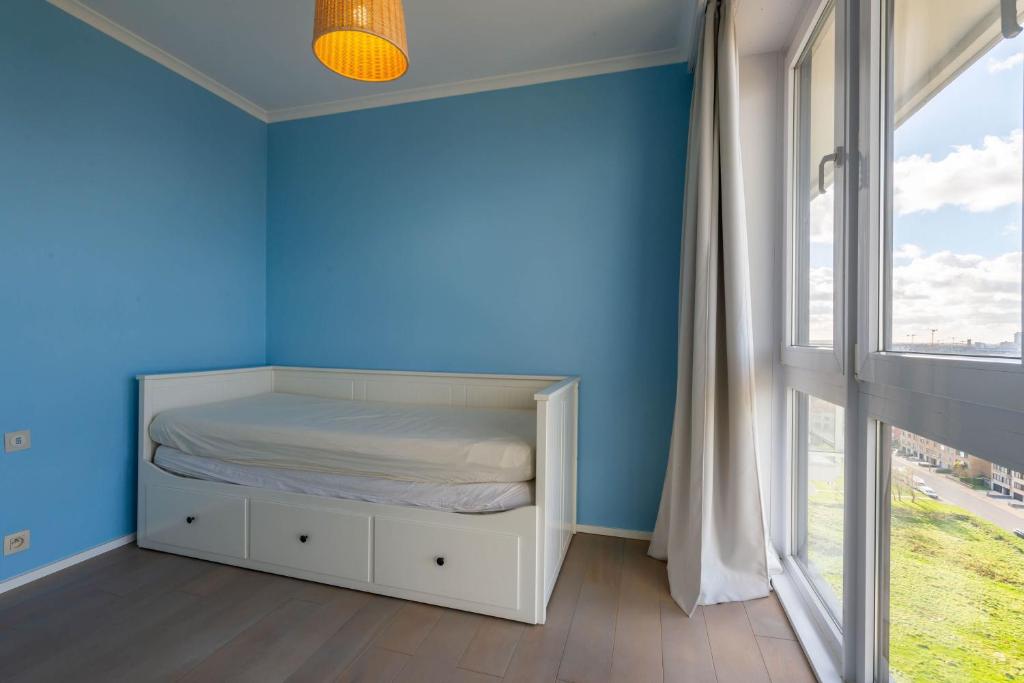 Postel nebo postele na pokoji v ubytování Panoramic & Modern apartment with sea view