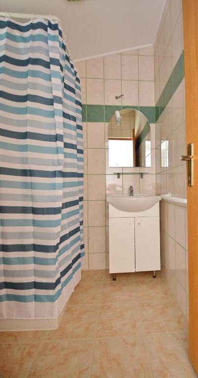 Kúpeľňa v ubytovaní Apartmani Cesarec