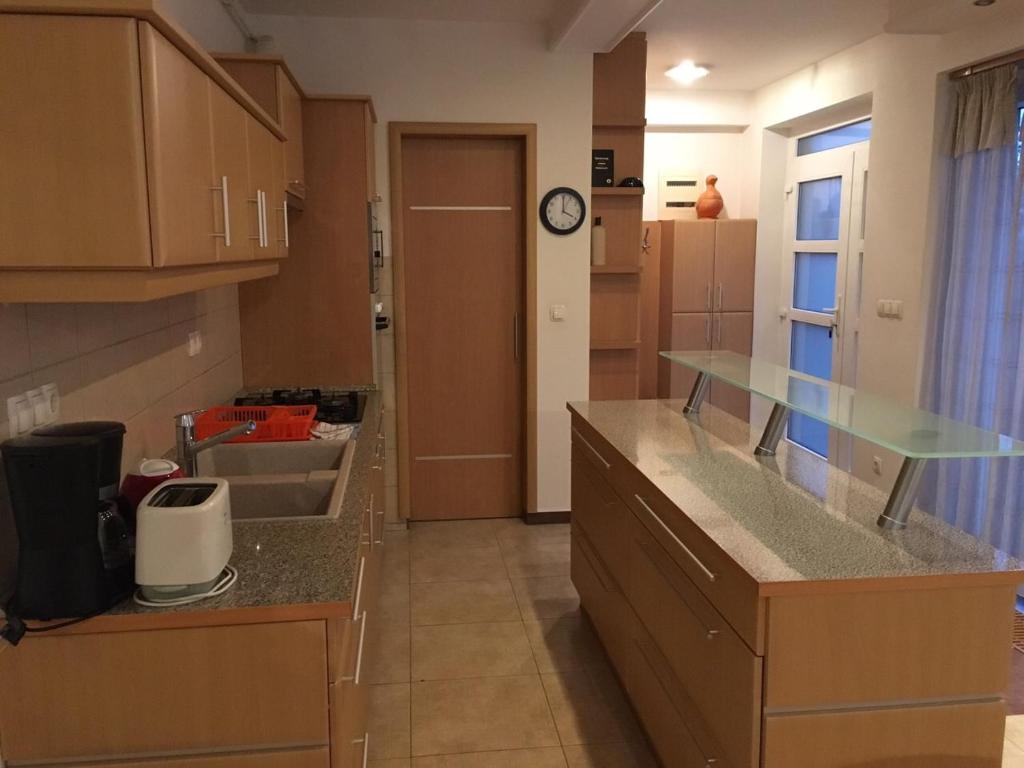Kuchyňa alebo kuchynka v ubytovaní Mary Apartmanház Hévíz