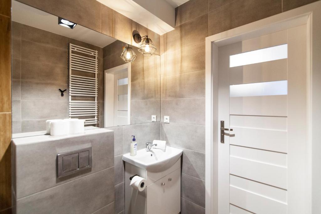 Kúpeľňa v ubytovaní Apartamenty Białystok - Botaniczna 9A/21