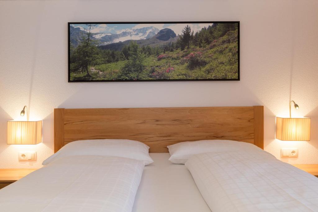 Postel nebo postele na pokoji v ubytování Residence Aichner