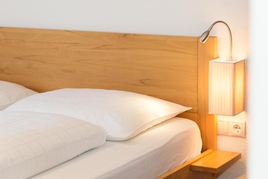 Postel nebo postele na pokoji v ubytování Residence Aichner