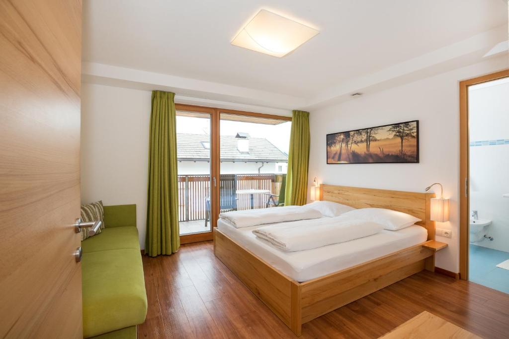 Postel nebo postele na pokoji v ubytování Residence Aichner