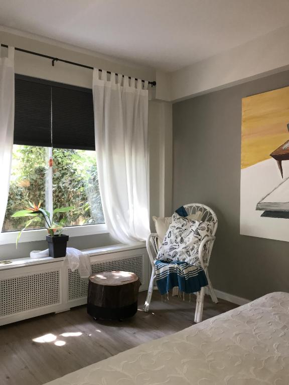Posteľ alebo postele v izbe v ubytovaní Paneon Apartments