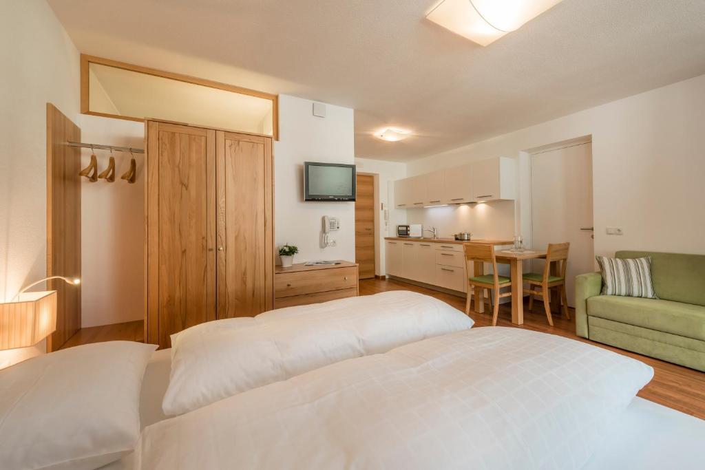 Postel nebo postele na pokoji v ubytování Residence Aichner