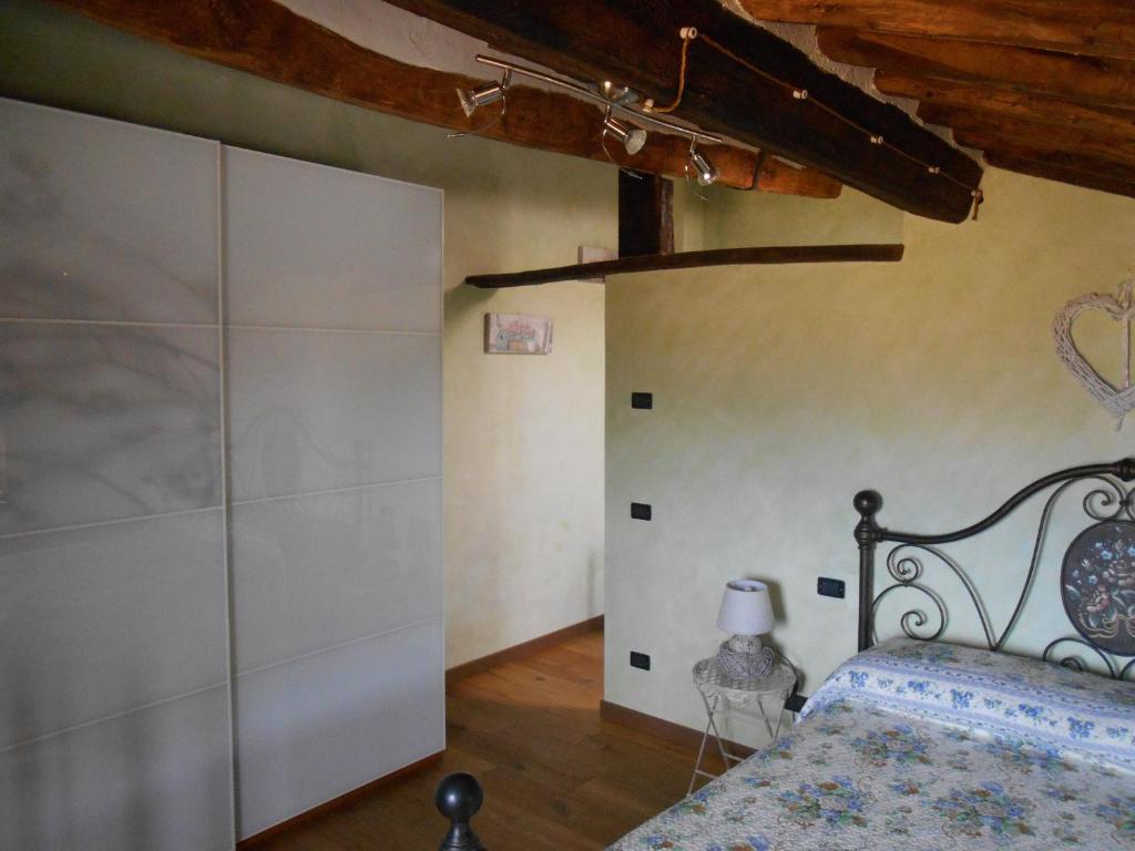 Postel nebo postele na pokoji v ubytování Podere Casenove