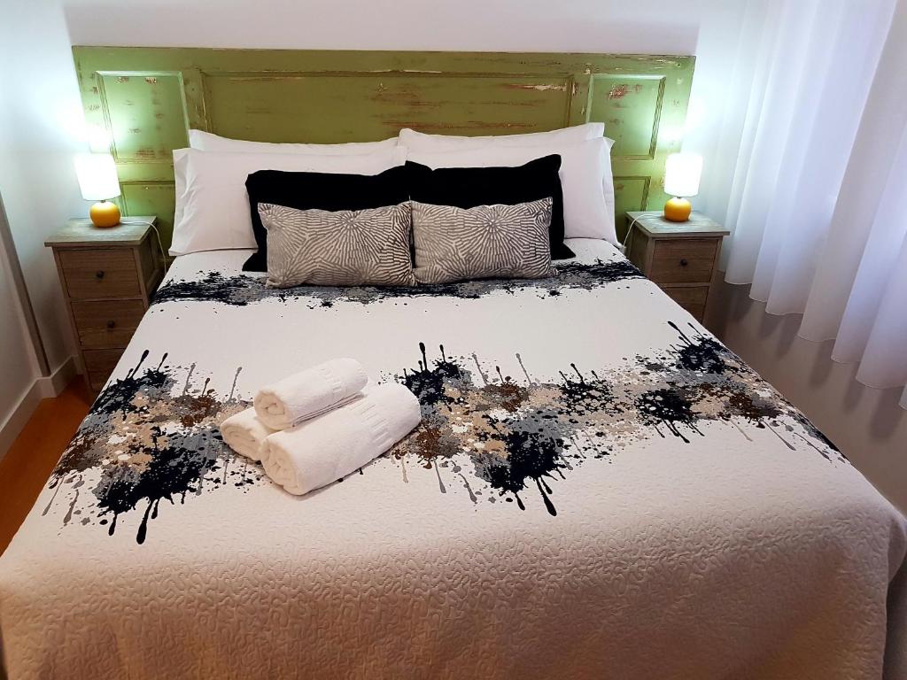 Cama o camas de una habitación en Pensión Sotelo