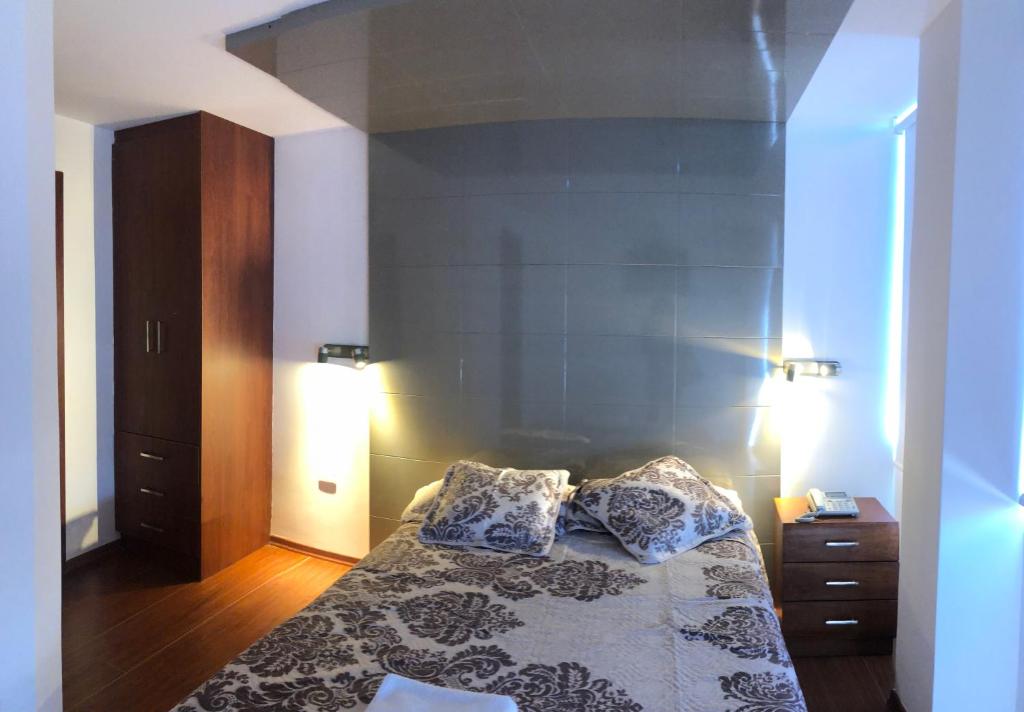 Postel nebo postele na pokoji v ubytování Hotel Bacastell