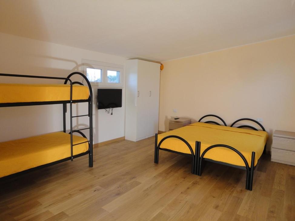 Postel nebo postele na pokoji v ubytování Pavia Ostello