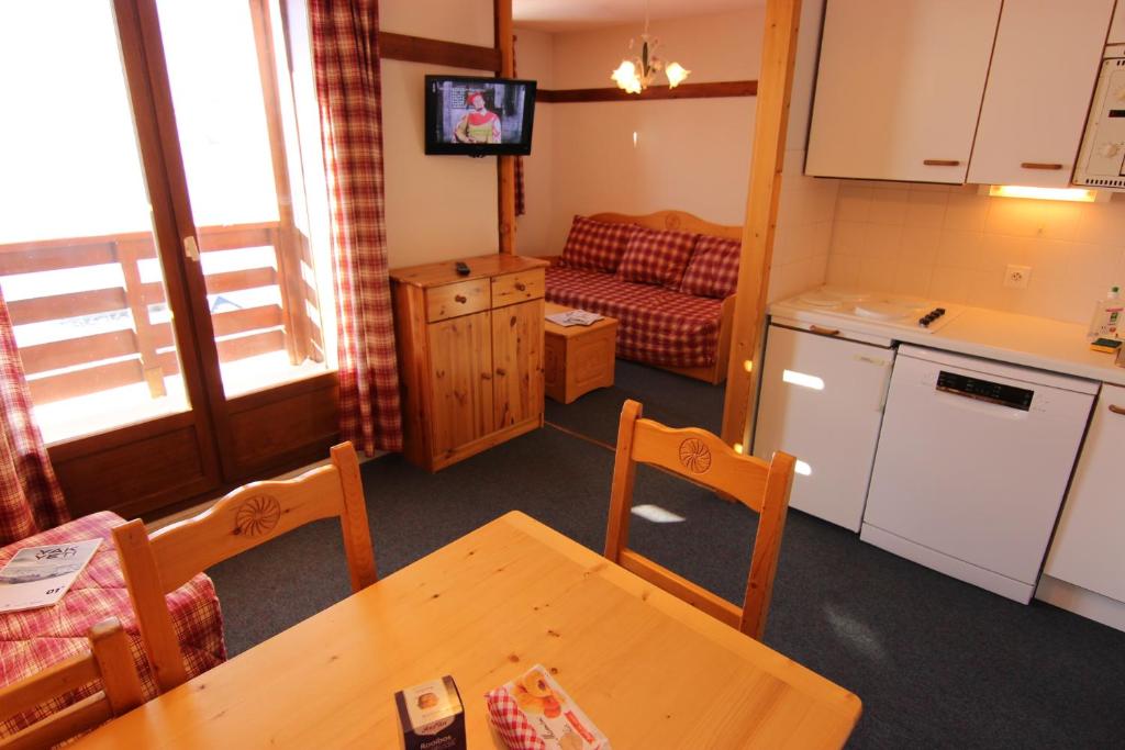 Kuchyň nebo kuchyňský kout v ubytování Reine Blanche Appartements VTI
